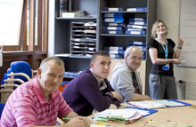 Trainees and Team working together in the Rehabilitation Training Unit